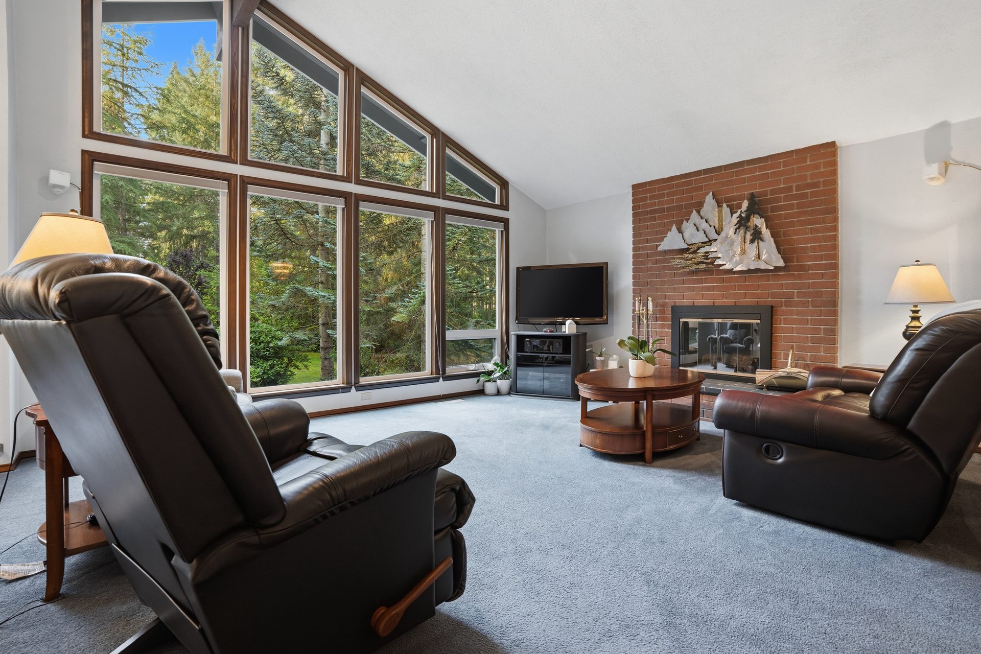 Living Room · The Fireplace at Center